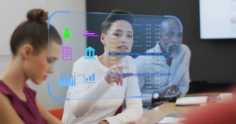 Team Discussing Holographic Data Interface in Modern Office