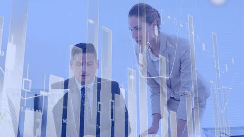 Colleagues Discussing Amidst Financial Interface Graphics