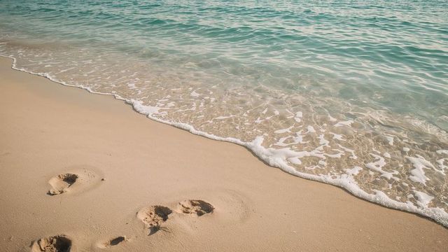 Footprints in Whispering Sands by Tranquil Turquoise Waters