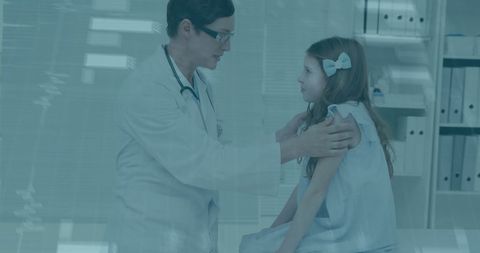 Pediatric doctor analyzing data for young patient's health