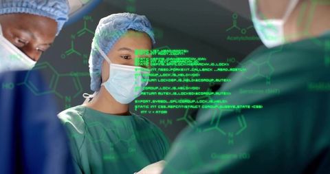 Lead surgeon directing robotic-assisted operation with green augmented reality overlays