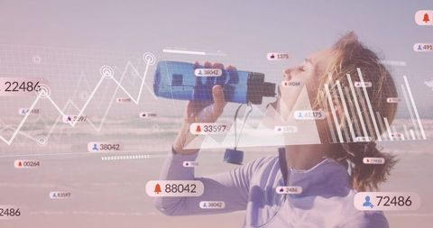 Woman Hydrating with Futuristic Data Overlay by Beach