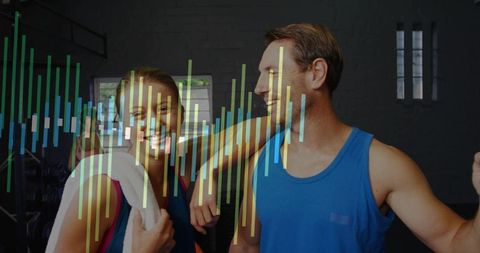 Smiling gym partners leaning together after workout with colorful vertical data overlay