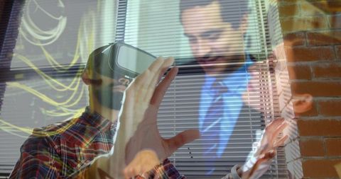 Man Using VR Headset in Business Collaboration Meeting