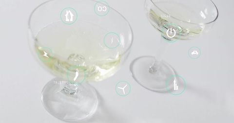 Minimal white wine coupe glasses with teal ui icons on clean white background