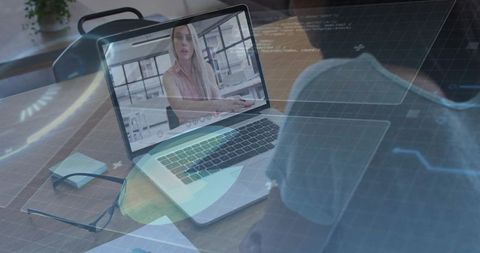 Remote presentation on laptop with female presenter and virtual data overlays in workspace