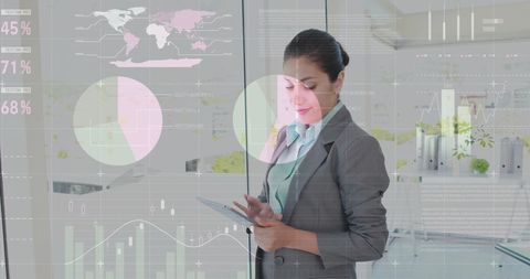Businesswoman engaging with digital data interface