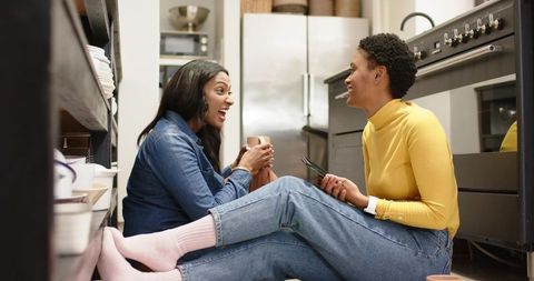 Relaxed friendship moment in cozy kitchen