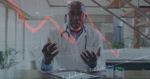 Doctor gesturing while discussing declining health metrics with red graph overlay