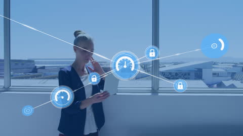 Businesswoman in Modern Office Using Tablet with Virtual Icons