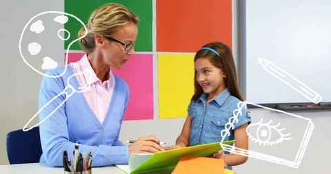 Educator Interacting with Schoolgirl in Art Class Setting