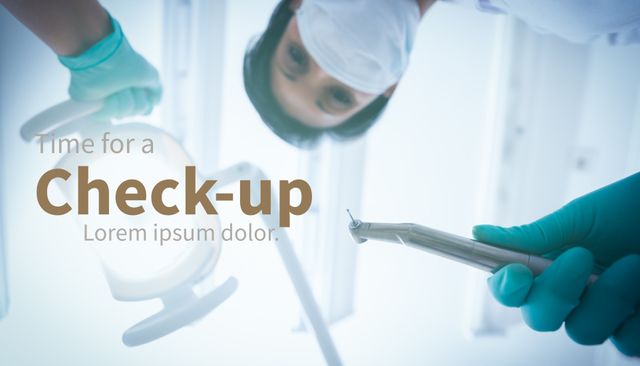 Promoting healthcare awareness, the image captures a dentist's tools from a patient's perspective, evoking the importance of regular check-ups. It could also be used for dental services advertisements or educational materials on oral hygiene.