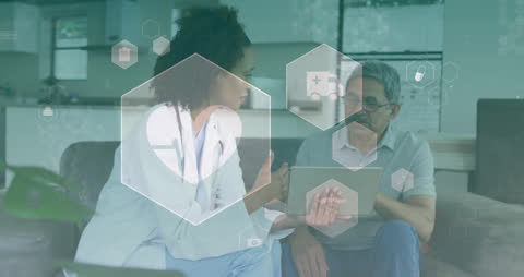 Doctor Consults Patient Using Tablet with Medical Icons Overlay