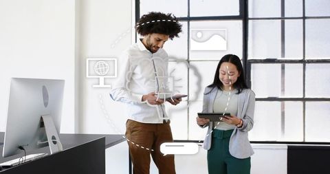 Collaborating professionals using tablets with cloud ai icons in modern minimalist office