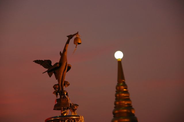 Low Angle View of Angel Statue Against Sky at Sunset - Download Free Stock Photos Pikwizard.com
