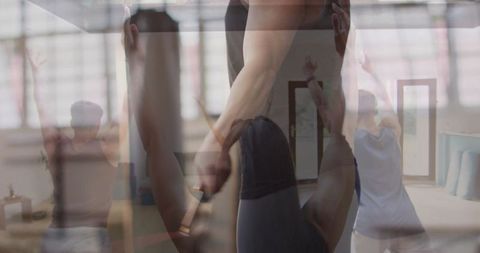 Yoga training with instructor in tranquil studio