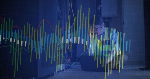 Korean Engineer Analyzing Server Data with Technology Charts Overlay