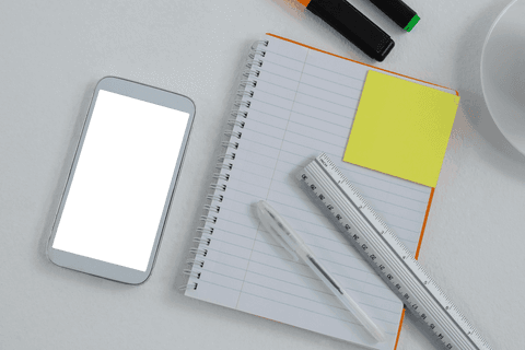 transparent workspace with notebook, smartphone, and stationery - Download Free Stock Videos Pikwizard.com