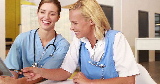 Healthcare Professionals Collaborating with Tablet - Download Free Stock Images Pikwizard.com