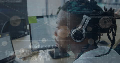 Data Processing Overlay on Businessman with Headset in Modern Office