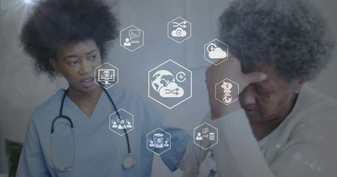 Nurse supporting elderly patient highlighting digital health technologies