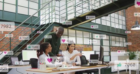 Diverse Team Engaging with Social Media Metrics in Office Environment