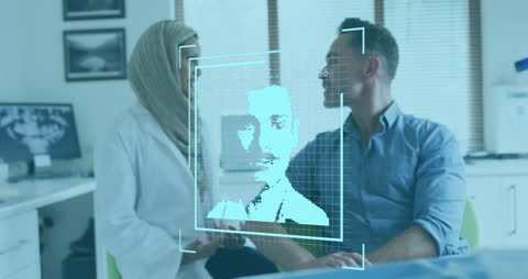 Doctor Consulting with Patient Using Advanced Technology Interface