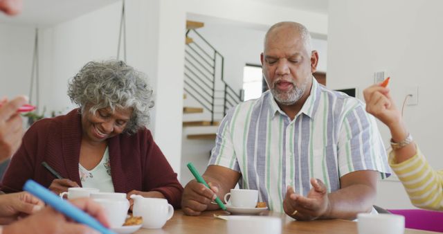 Senior Friends Enjoying Coffee and Cookies Together - Download Free Stock Images Pikwizard.com