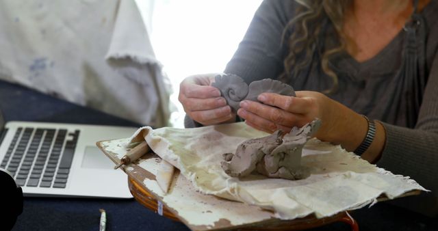 Female Artist Working with Clay in Home Studio - Download Free Stock Images Pikwizard.com