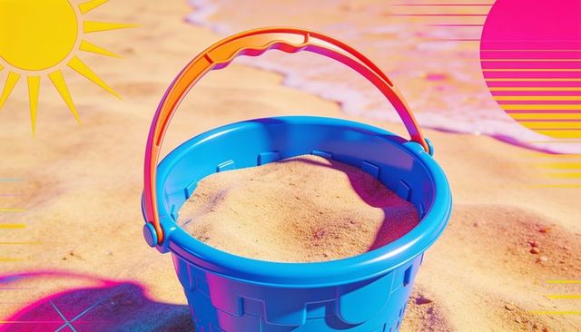 Blue beach pail holding golden sand with orange handle on sunlit shoreline for summer ads