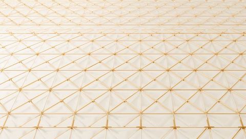 Golden geometric lattice ceiling with tessellated nodes and soft shadow pattern