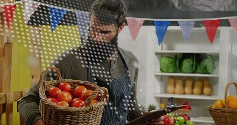 Market vendor with basket of fresh tomatoes at vibrant stall