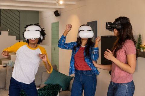 Diverse Female Friends Exploring Virtual Reality at Home