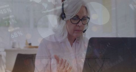 Senior Woman Analyzing Financial Data with Technology - Download Free Stock Images Pikwizard.com
