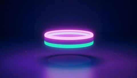 Hovering Neon Torus Ring Emitting Magenta Cyan Glow Over Glossy Studio Floor