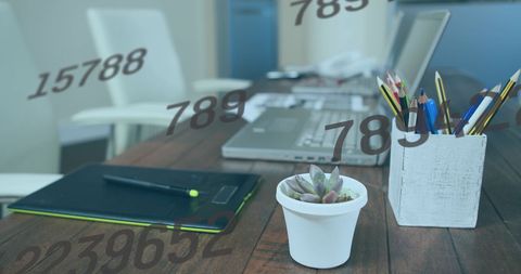 Conceptual Image: Changing Numbers over Tech Desk Setup - Download Free Stock Images Pikwizard.com
