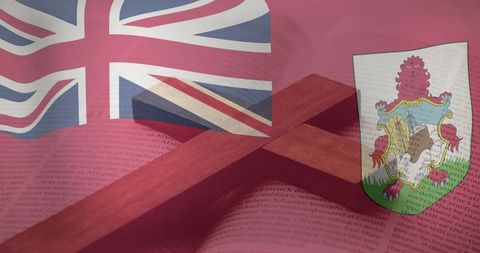 Wooden cross resting on open book with bermuda flag and crest overlay