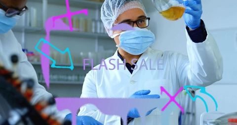 Lab technician conducting experiment with safety gear