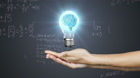Hands Holding Illuminated Brain Bulb with Mathematical Equations