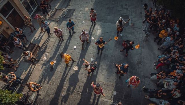 Buskers performing on sunlit urban plaza gathering crowd with guitars and percussion