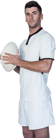 Confident rugby player holding ball over transparent background