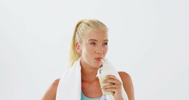 Blonde Woman Drinking Smoothie After Workout - Download Free Stock Images Pikwizard.com