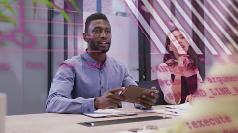 Multiethnic Team Analyzing Data in Modern Office