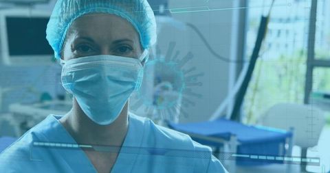 Healthcare Professional in Protective Gear Conducting Treatment