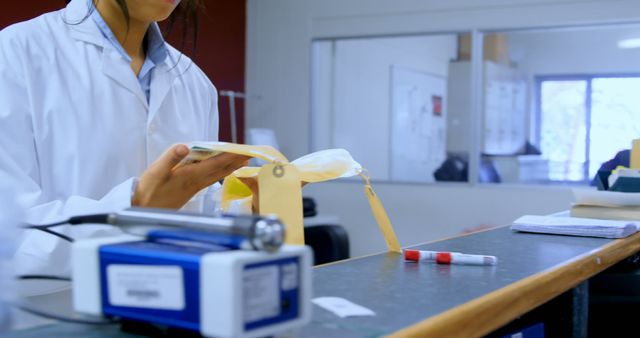 Laboratory Technician Opening Sealed Samples for Testing - Download Free Stock Images Pikwizard.com