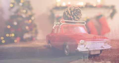 Red Toy Car with Pine Cone in Festive Christmas Scene - Download Free Stock Images Pikwizard.com