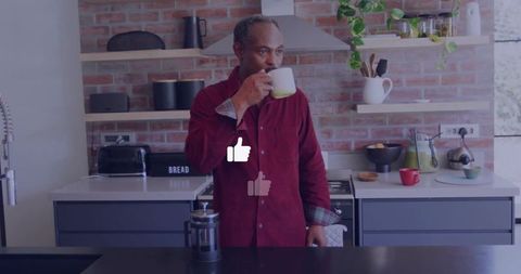 Man Enjoying Coffee in Cozy Modern Kitchen Setting
