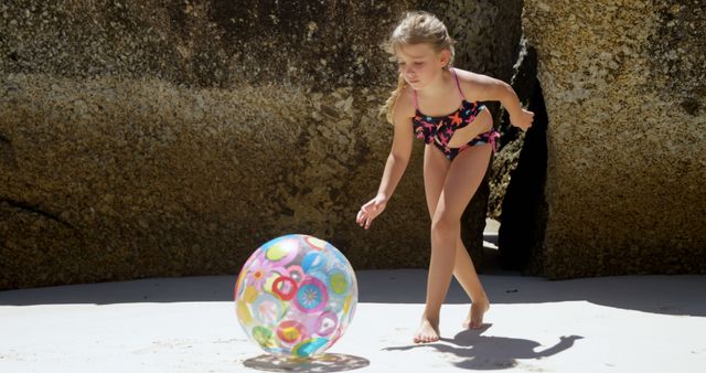 Girl Playing with Beach Ball at Sandy Beach - Download Free Stock Images Pikwizard.com