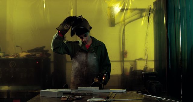 Female Welder Working in Industrial Workshop - Download Free Stock Images Pikwizard.com