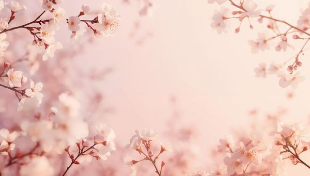 Soft pink cherry blossom frame with delicate spring blooms and pastel bokeh